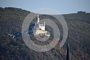 Marksburg, Braubach with to top of church tower Rhens next to it