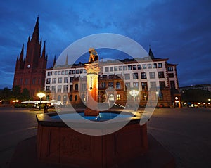 Marktkirche of red brick on a Schlossplatz at Night in Wiesbaden, the state capital of Hessen in Germany.