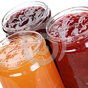 Marmalade in jars, isolated photo
