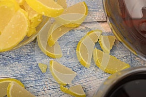 Marmalade lemon slices on wooden background. Sweet dessert. Close up