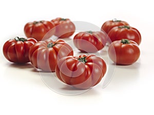 Marmande tomatoes on white table