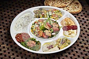 Marmaris Cold Mezza with Bread and salad served in dish isolated on table side view of middle east food photo