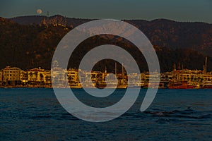MARMARIS, TURKEY: Landscape with a view of the old town, Fortress and ships in Marmaris at sunset.