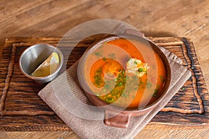 Marmitako soup in a ceramic bowl