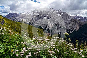 Marmolada. Alpine landscape in the Dolomites, Italy. Trekking on Monte Civetta overlooking the Marmolada Massif. Fassa Valley,