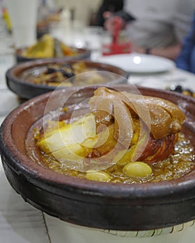 Marrakech, Morocco - 21 Feb 2023: Traditional Moroccan Tagine dishes with lamb, meat and vegetables