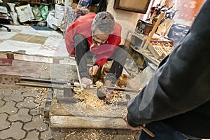 Craftsman working in famous Marrakesh souk