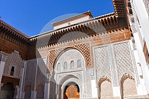 Marrakech, Morocco - Feb 10, 2023: Beautiful handicraft work inside the koranic school Medersa Ben Youssef in Marrakech