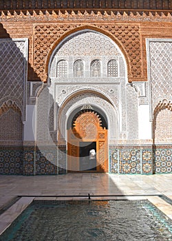 Marrakech, Morocco - Feb 10, 2023: Beautiful handicraft work inside the koranic school Medersa Ben Youssef in Marrakech photo