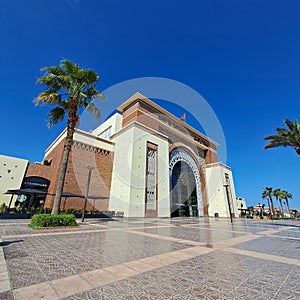 Marrakech Morocco train station with palm trees and blue sky