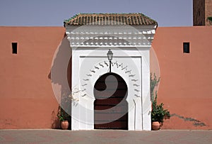 Marrakesh Islamic gate and terracotta wall