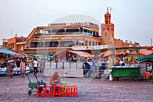 MARRAKESH, MOROCCO - JUNE 03, 2017: Evening in the famous Jemaa el-Fnaa square also Jemaa el-Fna, Djema el-Fna, or Djemaa el-Fnaa