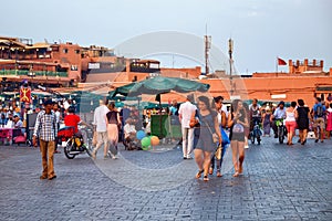 MARRAKESH, MOROCCO - JUNE 03, 2017: Evening in the famous Jemaa el-Fnaa square also Jemaa el-Fna, Djema el-Fna, or Djemaa el-Fnaa