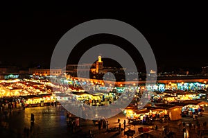 Marrakesh Souk market square in Morocco Jemaa el-Fnaa night time view panorama landscape photo