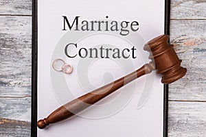 Marriage contract on clipboard.