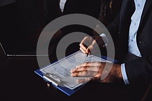 Marriage contract sign concept. Man and woman signing documents.