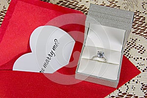 Marriage proposal on white heart