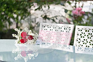 The marriage table with roses and pink chairs