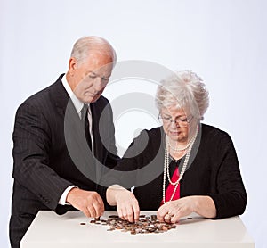 Married Couple Counting their Money for Retirement