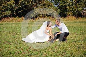 Married couple enjoying wedding day in nature