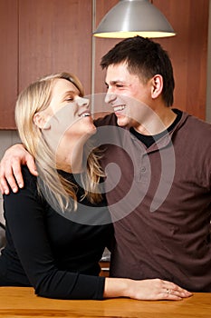 Married couple in kitchen