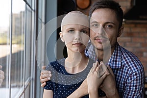 Married young couple fighting against woman oncology disease