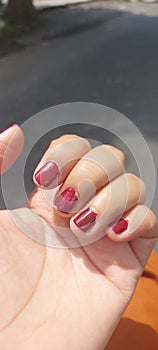 Marron nail polish pretty hand