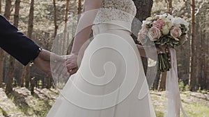 Marry Me Today And Everyday. Newlywed Couple Holding Hands, Shot In Slow Motion.