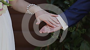 Marry Me Today And Everyday. Newlywed Couple Holding Hands, Shot In Slow Motion.