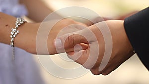 Marry me today and everyday. Newlywed couple holding hands, wedding shoot.