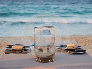Marsa Matruh, Egypt. Gazebo on the beach with table set. Candle on table. Relaxing context. Nobody on the beach