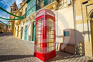 Marsaxlokk, Malta - Classic red British telephone box at the traditional fishing village of Marsaxlokk