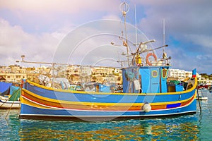 Marsaxlokk, Malta - Traditional colorful maltese Luzzu fisherboat at the old village of Marsaxlokk