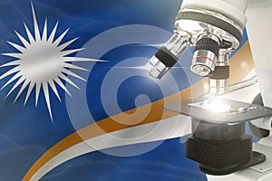 Marshall Islands science development concept - microscope on flag background. Research in medicine or biotechnology 3D
