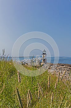 Marshall Point Lighthouse in Port Clyde Maine USA on a sunny summer day