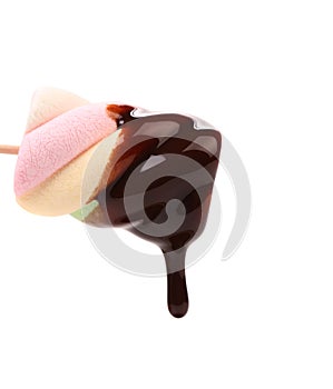 Marshmallow in chocolate syrop. Isolated.