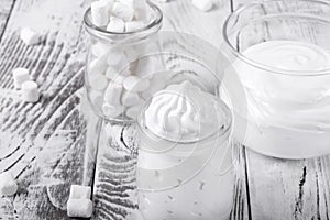 Marshmallow creme in glass jars