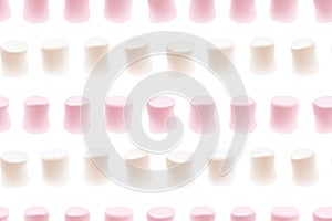Marshmallow seamless texture. Tasty white and pink marshmallows isolated on white background. Marshmallow candy seamless