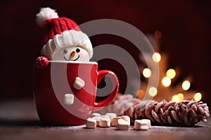 Marshmallow snowman is sitting in a Christmas hot chocolate with a cozy blur background