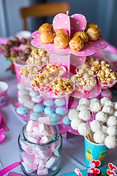 Marshmallow, sweet colored meringues, popcorn,