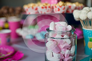 Marshmallow, sweet colored meringues, popcorn