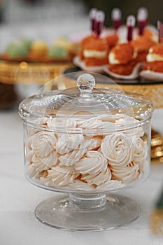 Marshmallows. Candy bar. Table with sweets, candies, and dessert. Close up. Wedding event