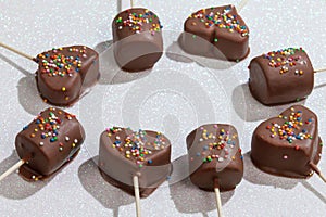 Marshmallows Covered With Chocolate And With Mini Colored Dragees