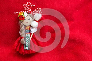 Martenitsa - traditional Bulgarian custom - red background with snowdrops