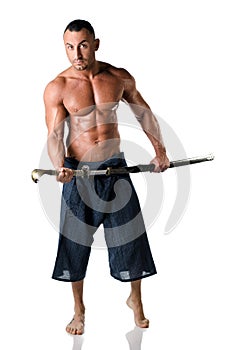 Martial art man: muscular man with kimono trousers and sword