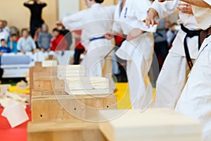 Martial artists breaks the wooden boards