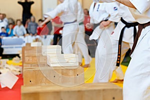 Martial artists breaks the wooden boards