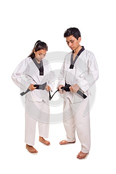 Martial artists put on uniforms full length