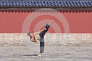 Martial arts master practicing at Temple of Heaven, Beijing, China