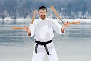 Martial arts with nunchaku photo